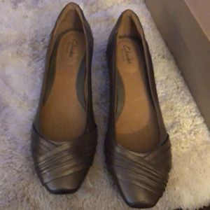 Clarks wedges. Burnished gold in color